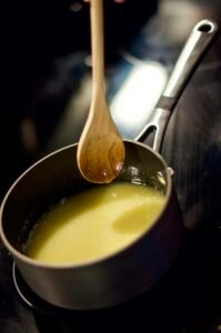 Golden pure desi ghee melting, representing organic ghee in Pakistan